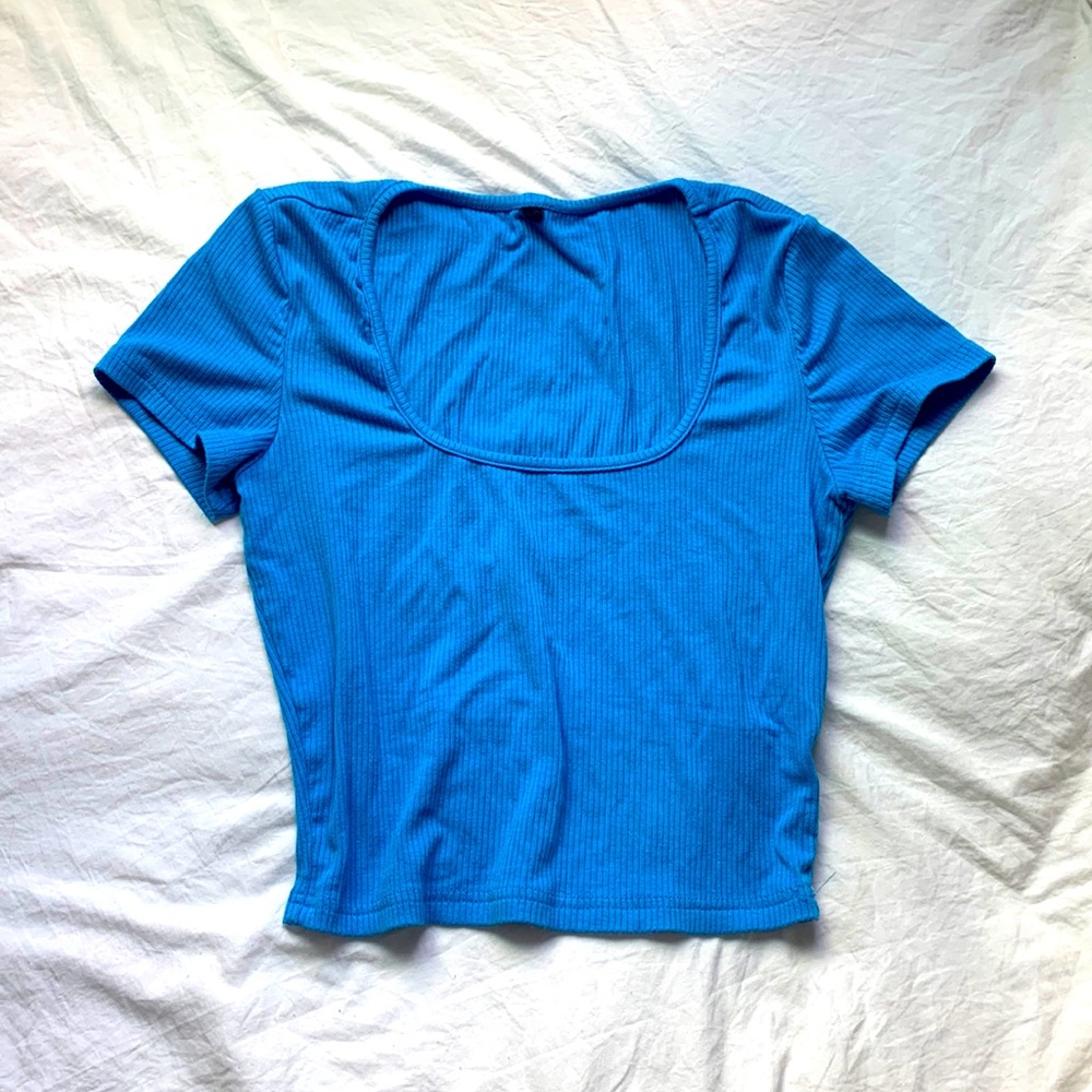 Bright blue cropped top